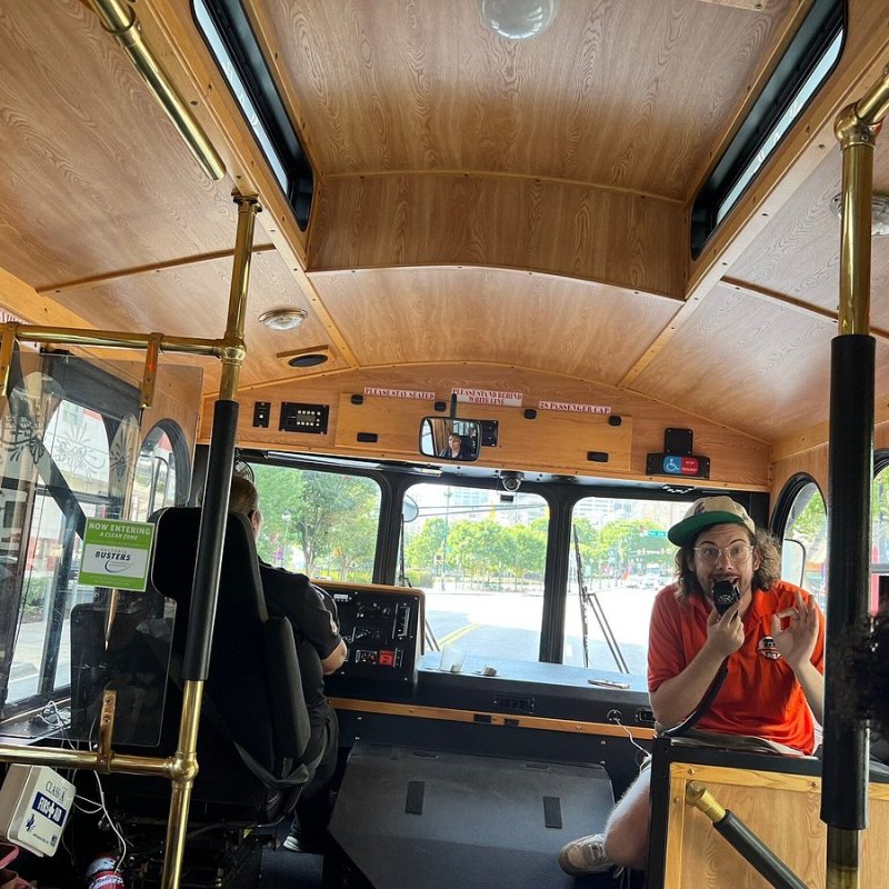 a group of people sitting at a train station