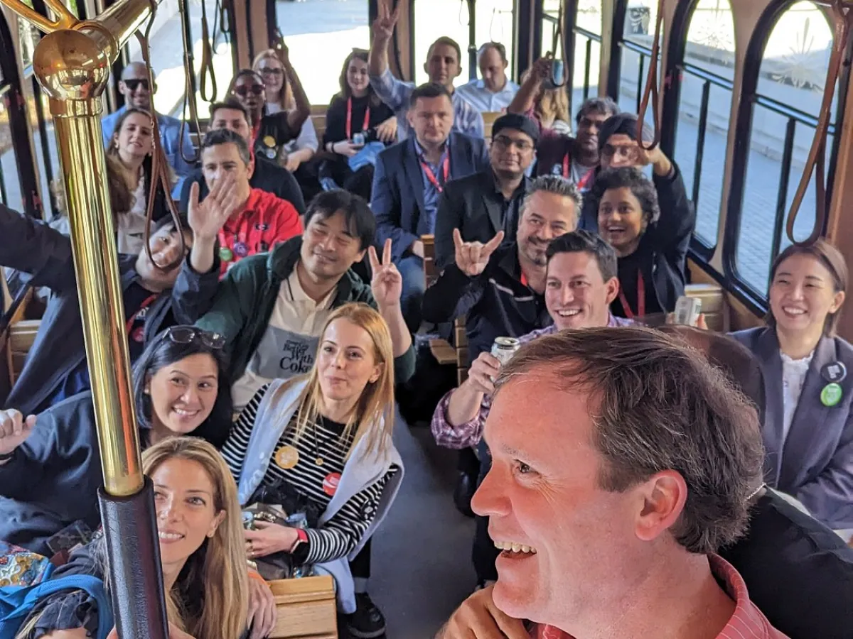 a group of people sitting on a bus