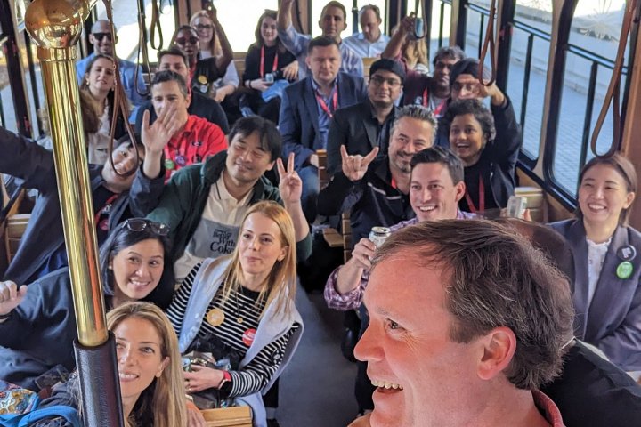 a group of people sitting on a bus