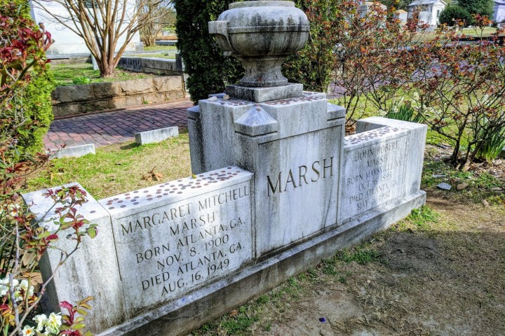 a statue of a flower garden